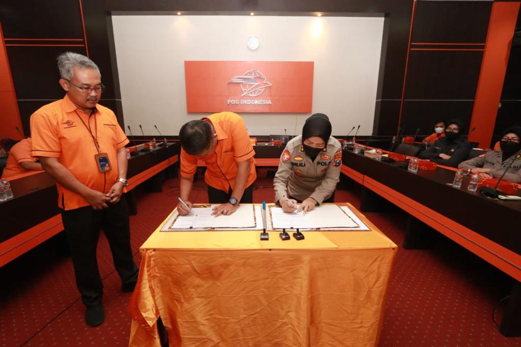 penandatanganan kerja sama pt pos indonesia dengan polda jatim 50175