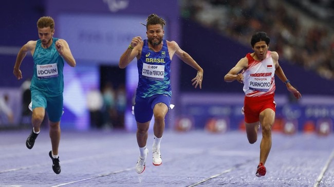wakil cabang atletik putra indonesia saptoyogo raih medali pertama di paralimpiade 78235