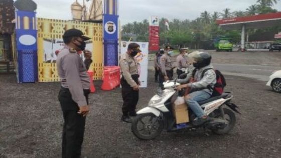 ditlantas polda bali lakukan sosialisasi larangan mudik lebaran 2021 13104