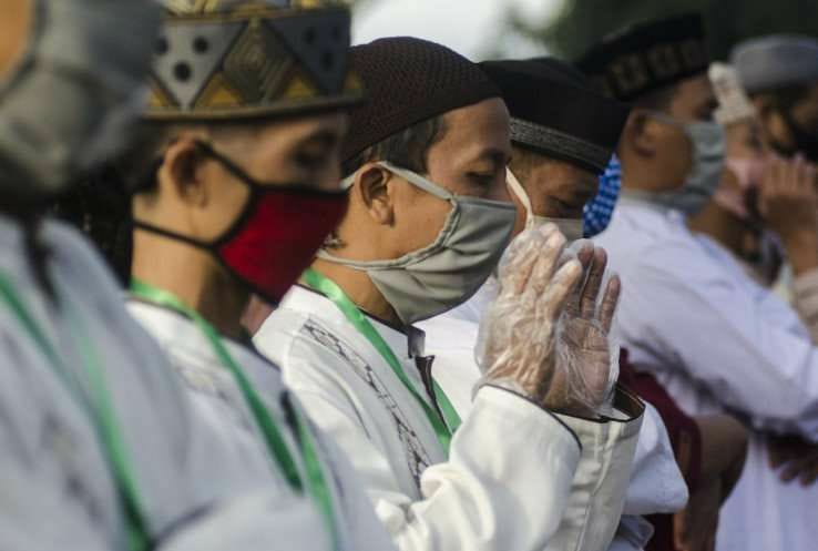 idi izinkan masyarakat lepas masker saat salat dan silahturahmi idulfitri 56418