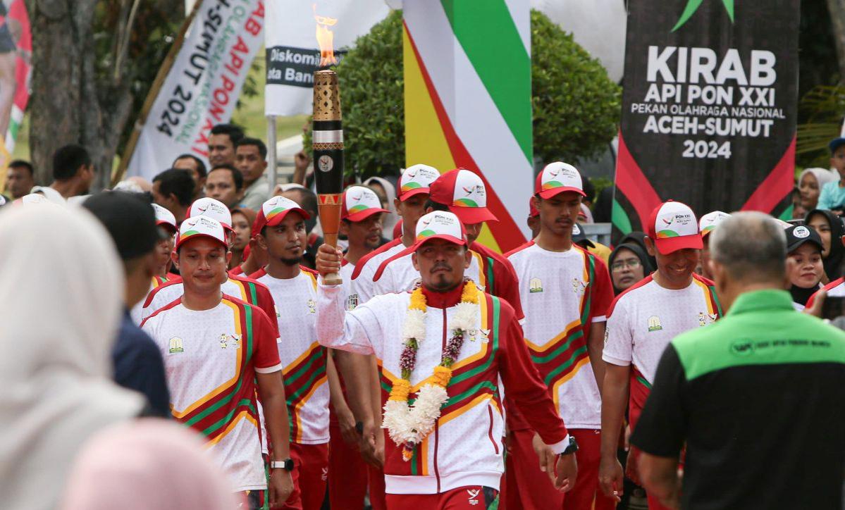 kirab obor finis di banda aceh pon xxi siap dibuka oleh presiden 78527