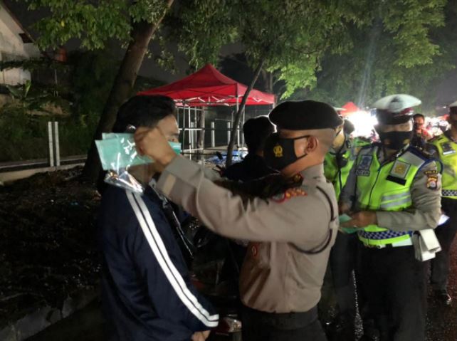 polda banten laksanakan patroli skala besar disiplin prokes 13012