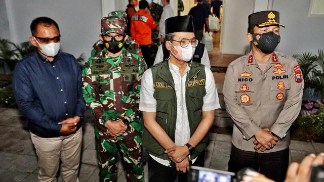 polda jatim berlalukan surat ijin keluar masuk untuk warga bangkalan 28991