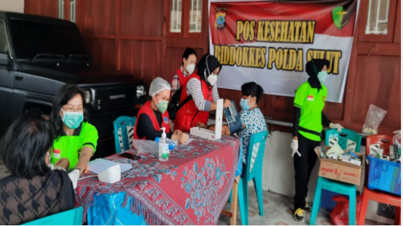 polda sulut gelar pelayanan kesehatan gratis korban banjir di karombasan utara 37323