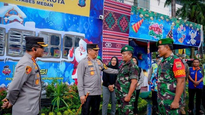 polda sumut turunkan 12 ribu polisi amankan 9 898 gereja jaga ibadah umat nasrani di sumut 68060