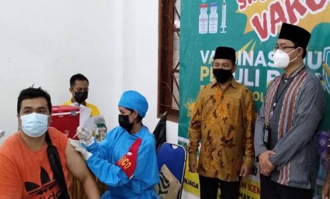 vaksinasi nu bersama polda bali sasar 1 000 warga denpasar 9700